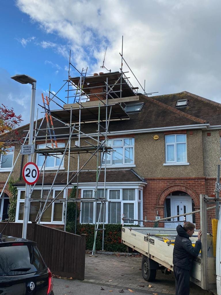 DDJ Scaffolding crew in front of a house they have scaffolded